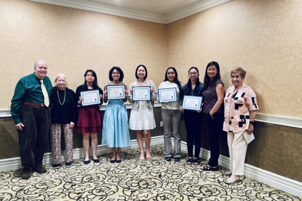 Members of the Soroptimist with their certificates of recognition