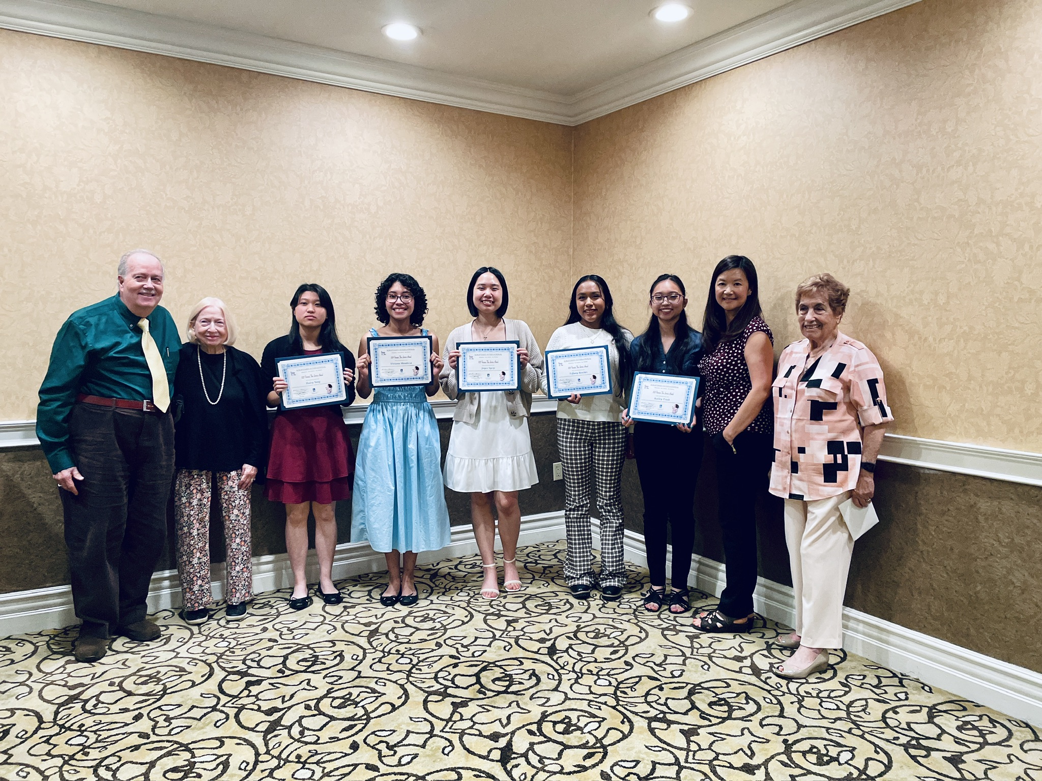 Members of the Soroptimist with their certificates of recognition