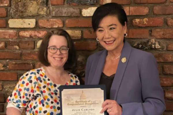 New President, Julie Carlson, receives Certificate of Congressional Recognition from U.S. Congresswoman Judy Chu (D-28).