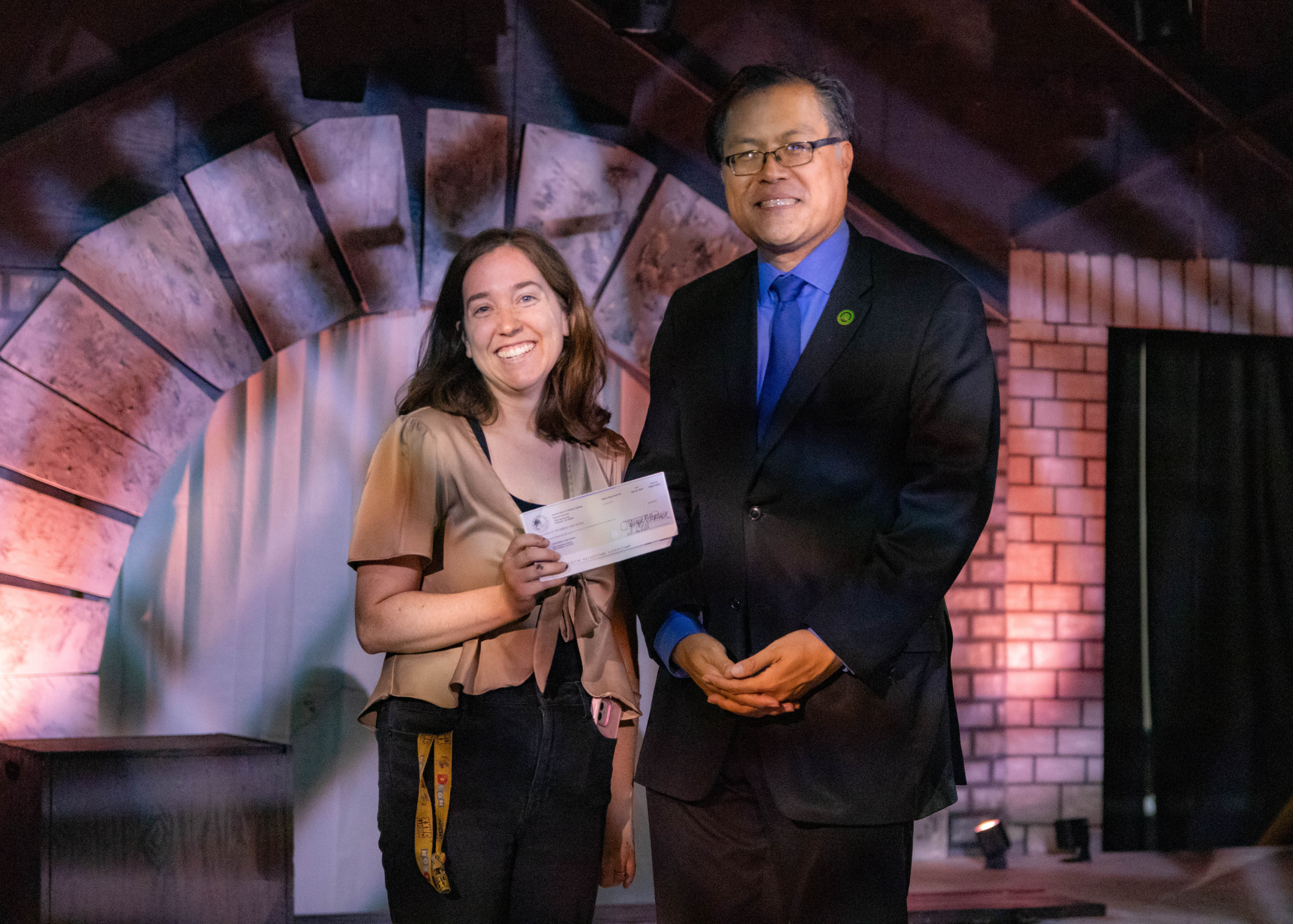 San Gabriel High School’s drama program received a generous boost just in time for the opening night of their fall musical, Alice by Heart. On September 27, Assemblymember Mike Fong presented a $5,000 grant, funded by the Barona Education Grant Program, to SGHS drama teacher Kelsey McNeilly to support the technical theater class’ woodshop. The funds will enable the purchase of industry-level tools, which will enhance the department’s ability to construct detailed sets and props, and to provide students with hands-on experience in carpentry, construction, and the art of stagecraft. (Photo: Grant Sapcharoenlert)