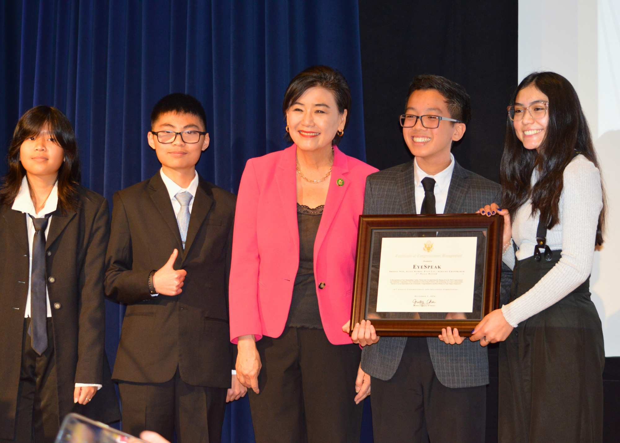 Congresswoman Judy Chu celebrated the 2nd place win of these MKHS students. (From left to right: Athicha Chanpradub, Evan Lau, Representative Chu, Drexel Ngo, and Alina Ramos.)